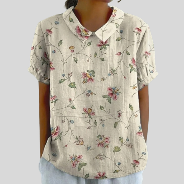 Elegante dames top met bloemenprint en nette polokraag, vloeiende pasvorm voor elk figuur