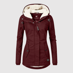 Warme dames winterjas met capuchon en diepe zakken voor dagelijks gebruik in de winter