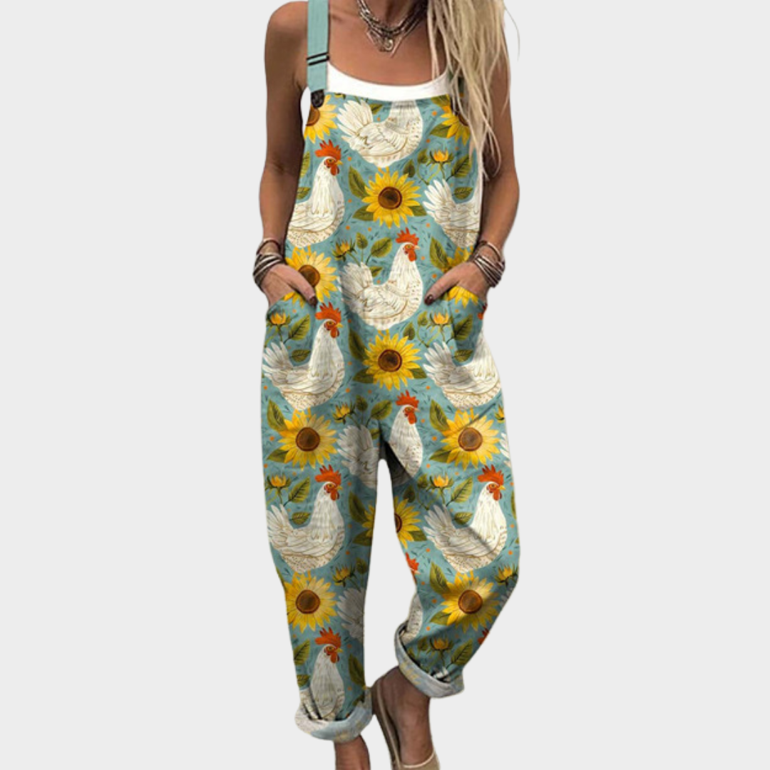 Luchtige jumpsuit met bloemenprint, wijde pijpen en verstelbare bandjes in soepele stof