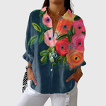 Kleurrijke dames blouse met bloemenprint, ruime vloeiende pasvorm en nette knoopsluiting