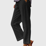 Elegante damesbroek in effen kleur met rechte pijpen, sierstiksel en discrete voorzak