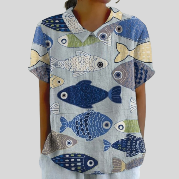 Elegante dames top met tijdloze bloemenprint en polokraag met een soepele val