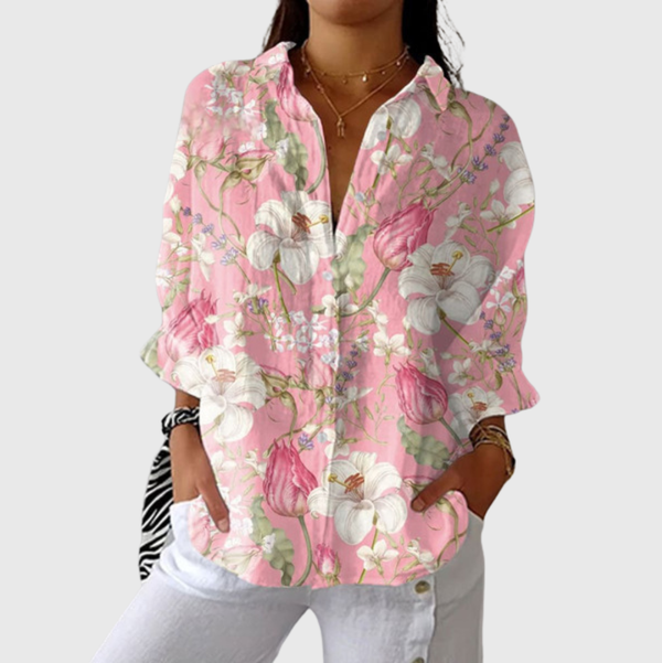 Zachte damesblouse met kleurrijke bloemenprint, ruime snit en verstelbare mouwen