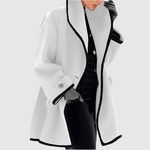 Oversized damesjas met zwarte contrasterende randen en ruime comfortabele snit