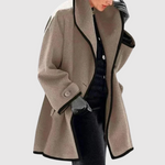 Oversized damesjas met zwarte contrasterende randen en ruime comfortabele snit