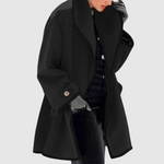 Oversized damesjas met zwarte contrasterende randen en ruime comfortabele snit