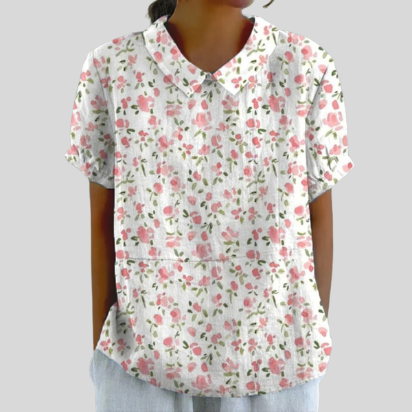 Elegante dames bloementop met polokraag, soepele snit en tijdloze bloemenprint