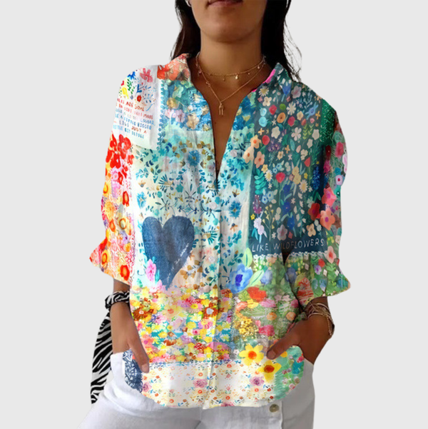 Luchtige damesblouse met kleurrijke print, knoopsluiting en verstelbare lange mouwen