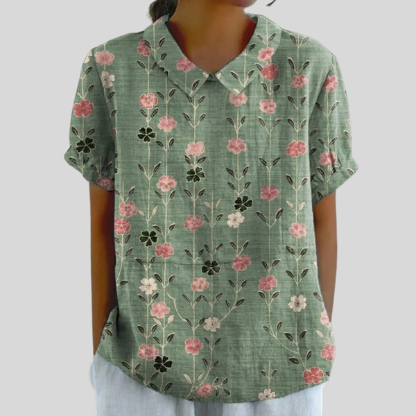 Losvallende dames top met bloemenprint van ademende stof in een geliefd model
