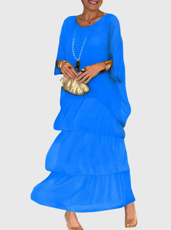 Elegante lange jurk met vloeiende val in een tijdloze effen kleur voor dames