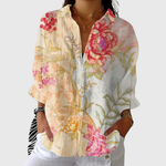 Lichte damesblouse met vrolijke zomerprint in zachte kleuren en lange mouwen