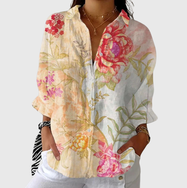 Lichte damesblouse met vrolijke zomerprint in zachte kleuren en lange mouwen