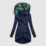 Elegante lange dames parka met capuchon en diepe steekzakken in effen kleur