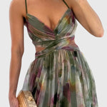 Lange maxi jurk met romantische bloemenprint, hoge taille en gekruiste bandjes