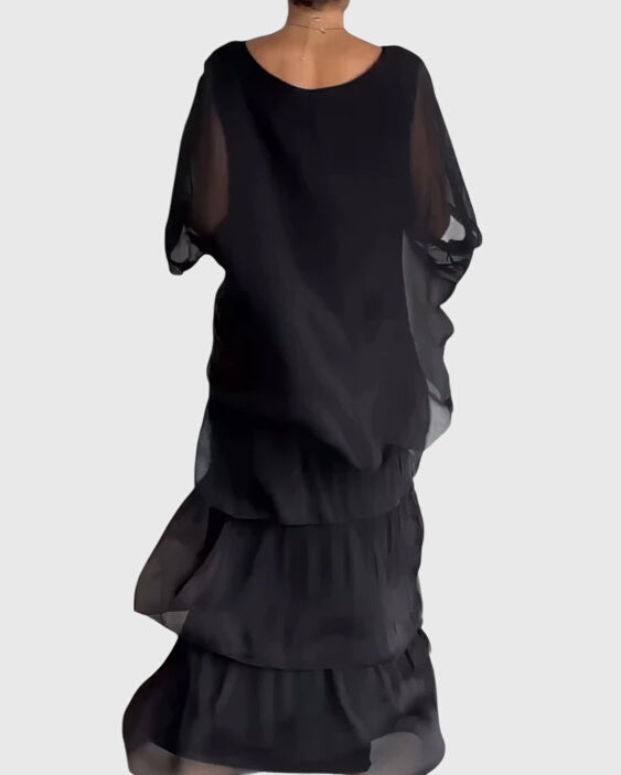 Elegante lange jurk met vloeiende val in een tijdloze effen kleur voor dames