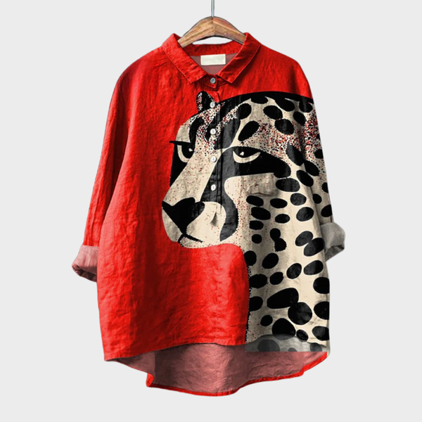 Lichte dames zomerblouse met lange mouwen en artistieke print in zomerse tinten