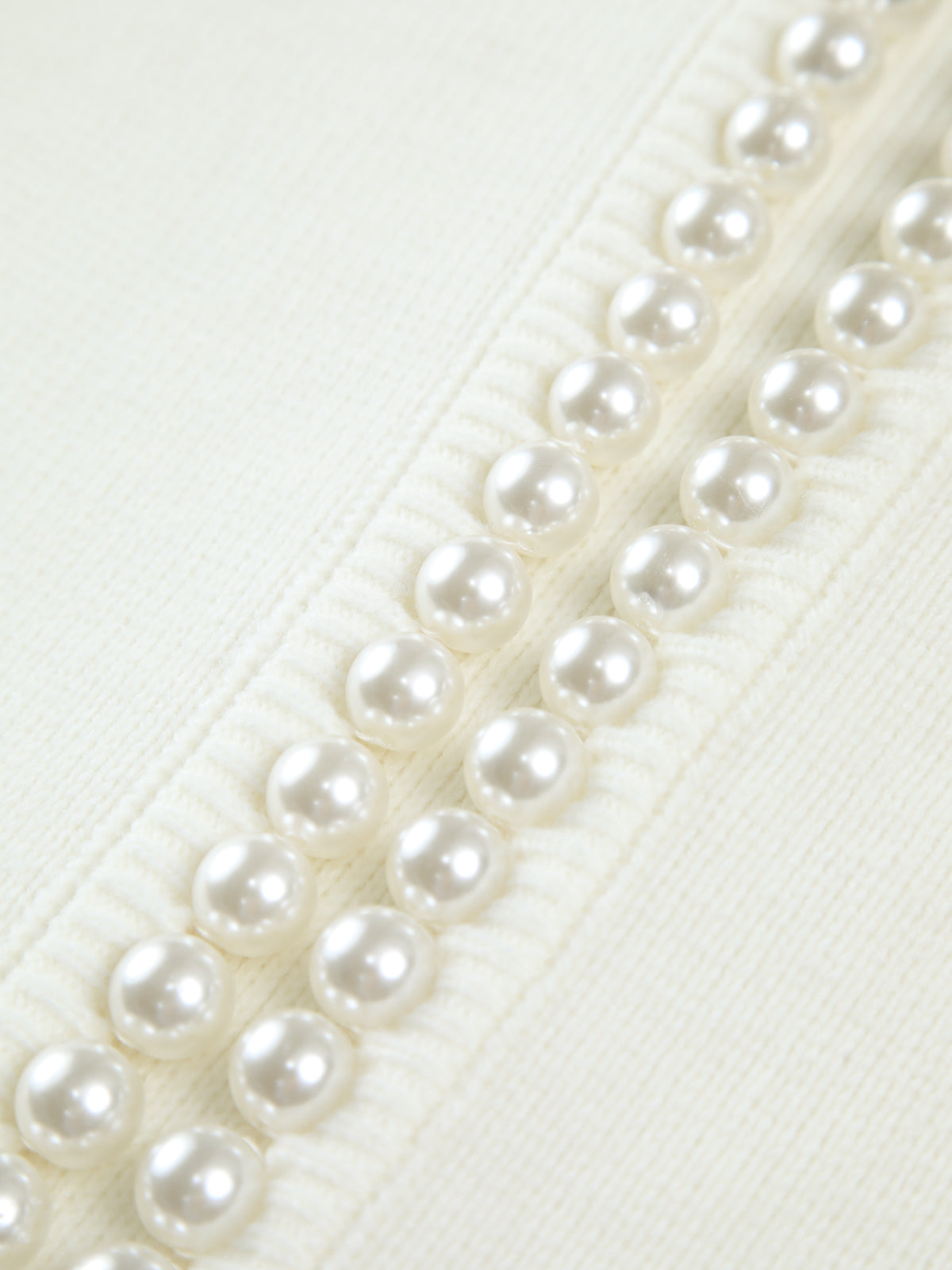 Floor vest met pareldetails