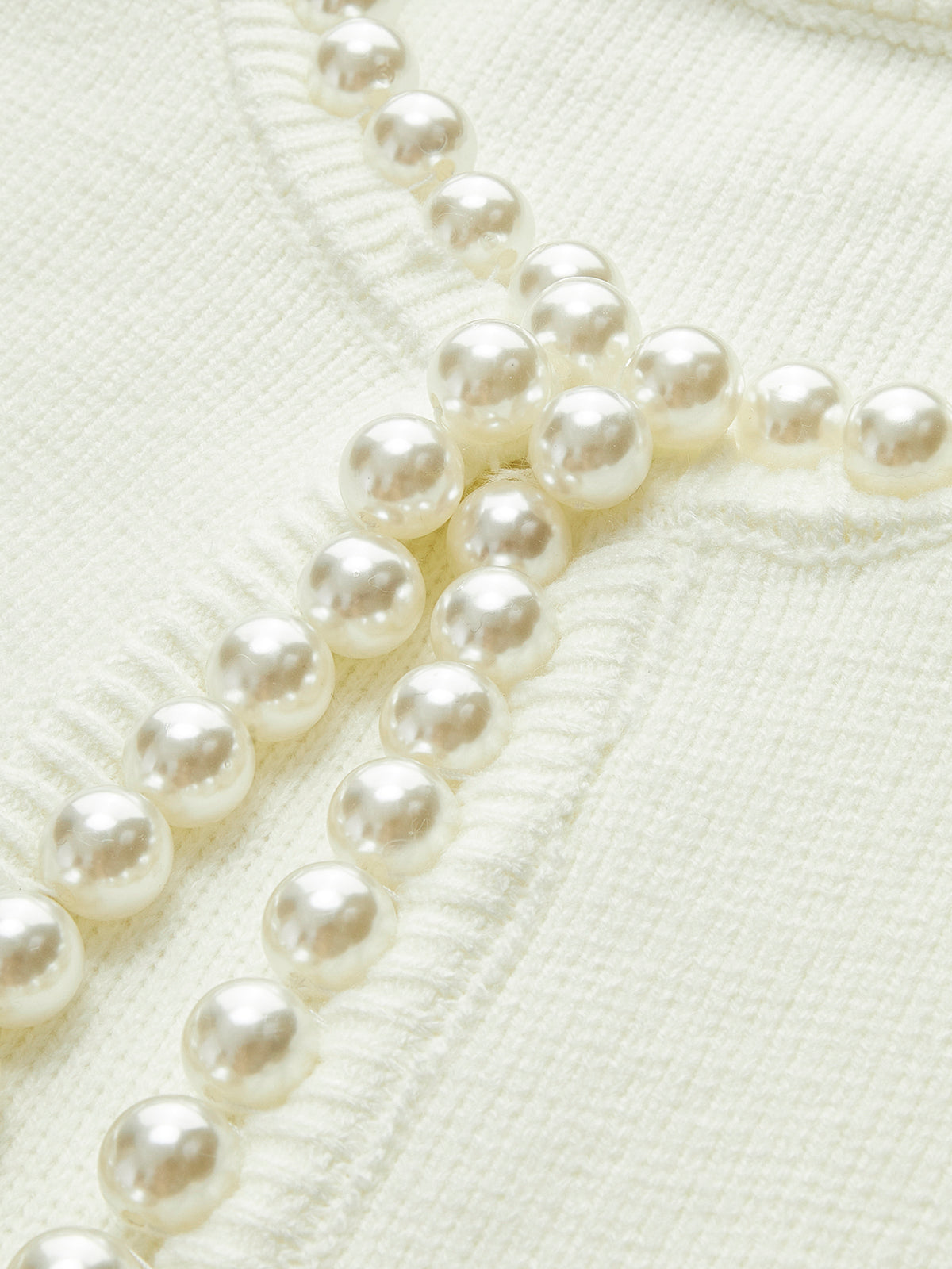 Floor vest met pareldetails