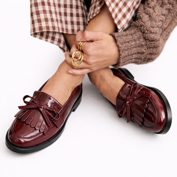 Elegante dames mocassins met sierlijke strik op de wreef en een verzorgde afwerking