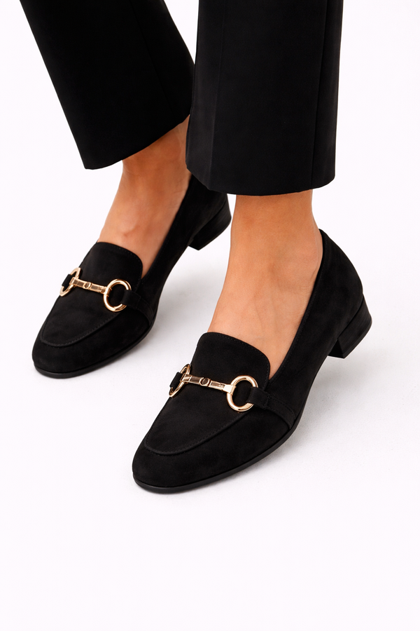 Charmante klassieke dames mocassins in een effen tint met sierlijke handgemaakte details