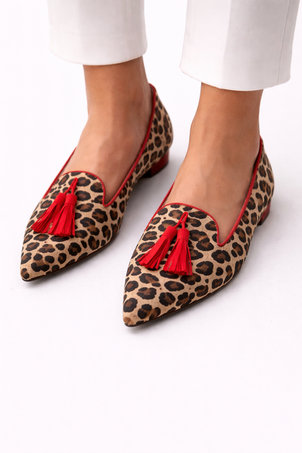 Safari mocassins met luipaardprint in warme tinten en elegante handgemaakte afwerking