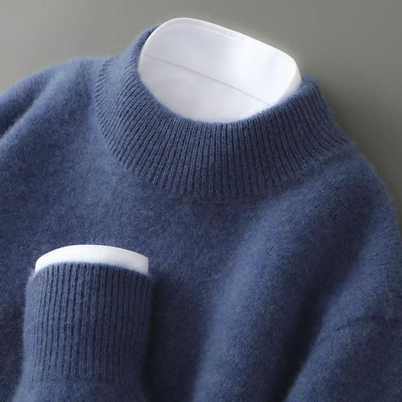 Unisex kasjmier trui in blauw met opstaande col en geribde afwerking
