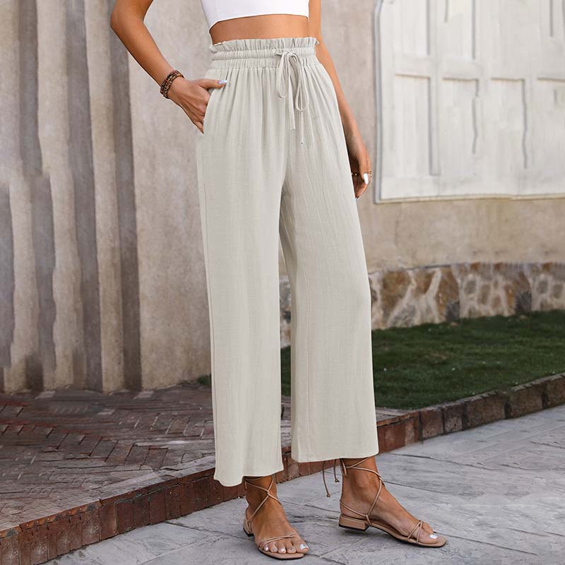 Luchtige loungebroek met wijde pijpen, koord in de taille en cropped lengte in een lichte tint