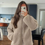 Zachte warme winterjas met capuchon, rits en ruime zakken in effen fleece voor dames