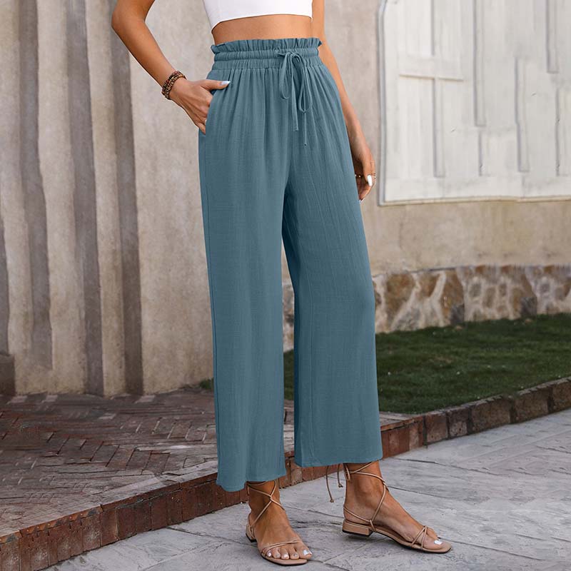 Luchtige loungebroek met wijde pijpen, koord in de taille en cropped lengte in een lichte tint