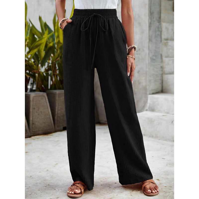 Lichte casual broek met wijde pijpen en elastische taille met koord in een zachte tint