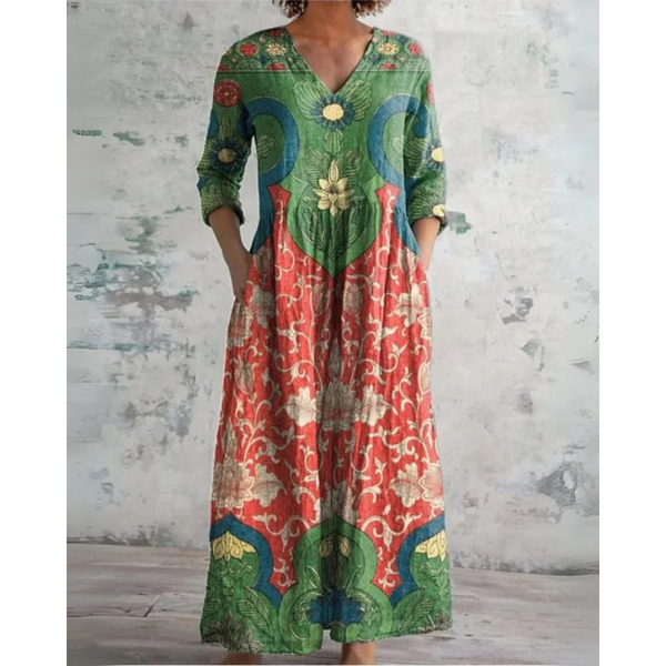 Lange maxi jurk met vintage bloemenprint in warme tinten, V-hals en taille