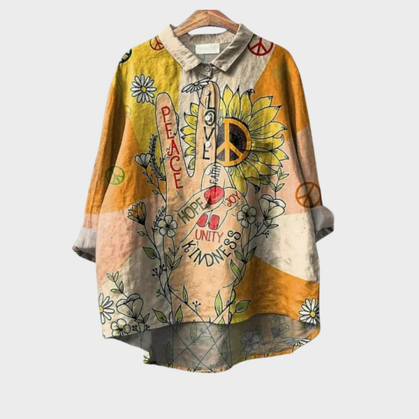 Dames zomerblouse met vloeiende pasvorm en artistieke print in lichte zomerstof