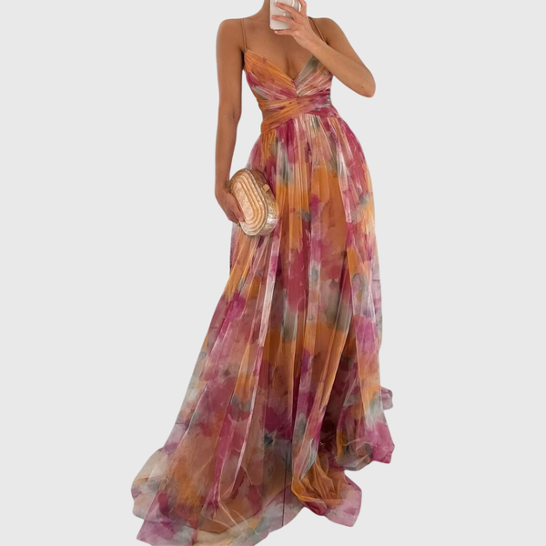Lange maxi jurk met romantische bloemenprint, hoge taille en gekruiste bandjes