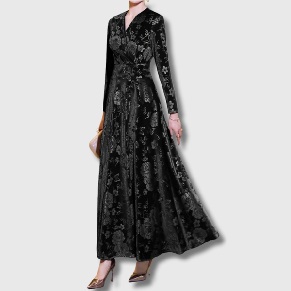 Elegante bloemenjurk in zwart met goud jacquard, wikkeltop en uitlopende rok