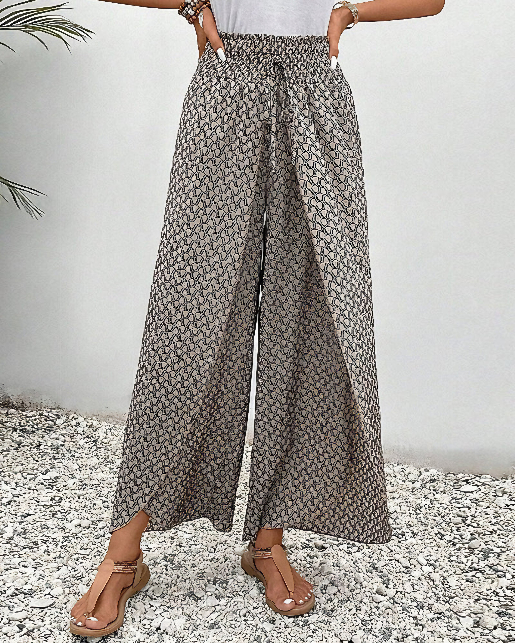 Relaxte wijde damesbroek met moderne print, elastische tailleband en soepel vallende pijpen