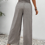 Relaxte wijde damesbroek met moderne print, elastische tailleband en soepel vallende pijpen