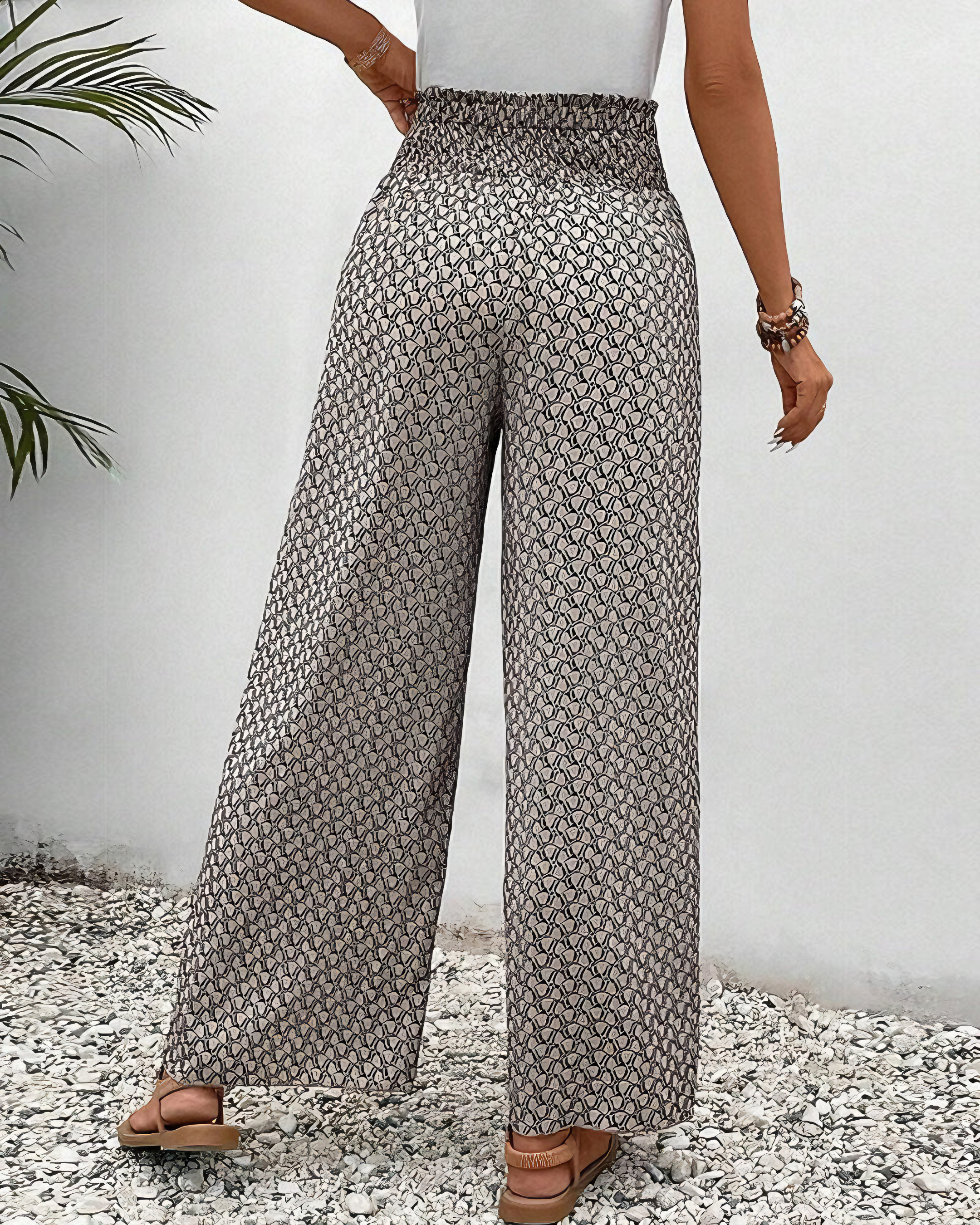 Relaxte wijde damesbroek met moderne print, elastische tailleband en soepel vallende pijpen