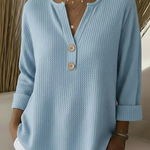 Nelleke dames top met structuur en henley-knoopsluiting