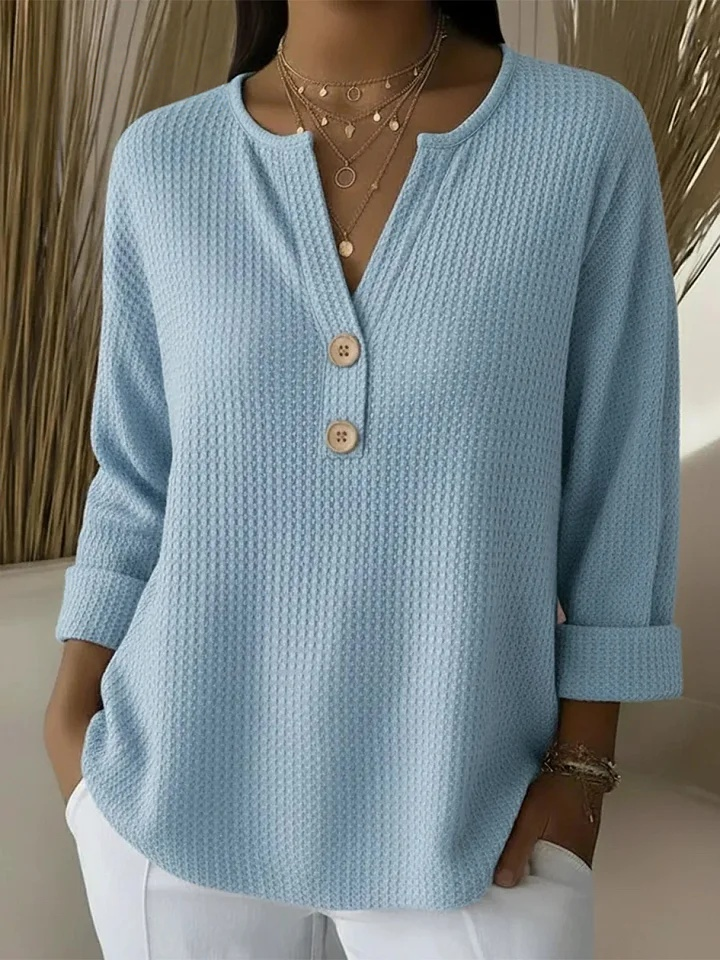 Nelleke dames top met structuur en henley-knoopsluiting