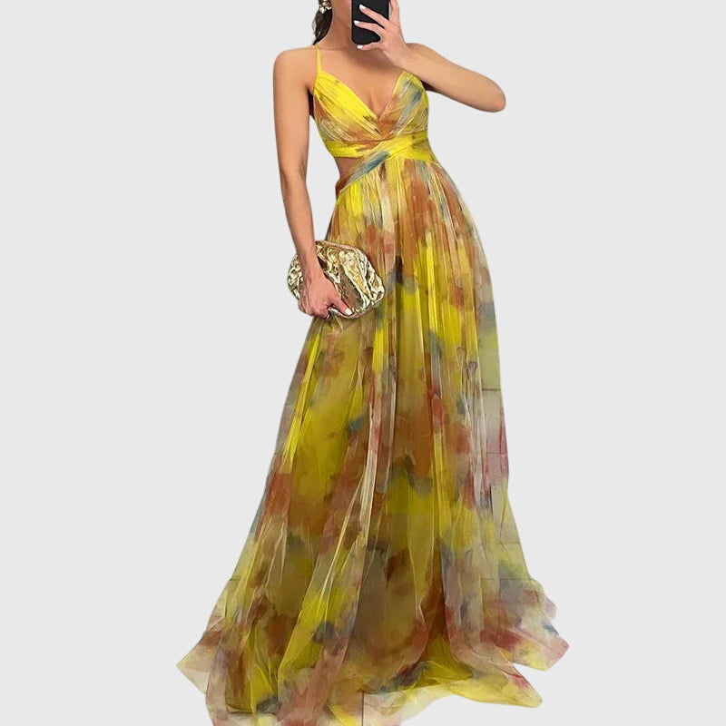 Lange maxi jurk met romantische bloemenprint, hoge taille en gekruiste bandjes