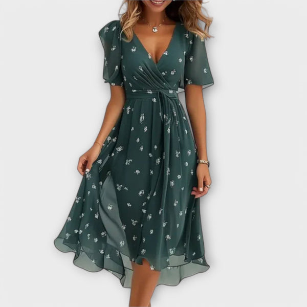 Elegante jurk met V-hals, aansluitend silhouet en soepel vallende nette stof