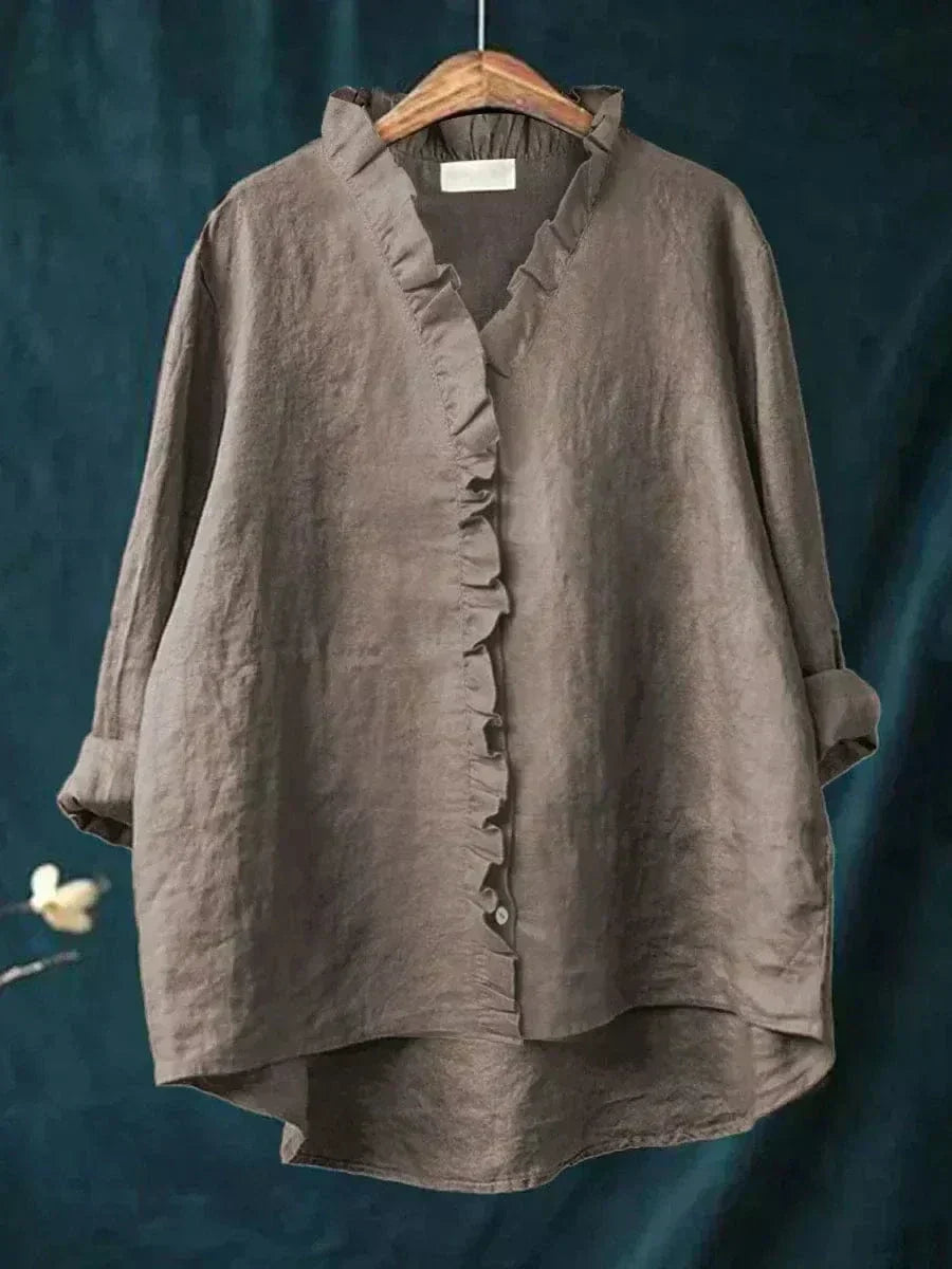 Lichte dames zomerblouse met verfijnd dessin en lange mouwen in ademende stof