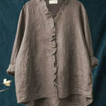 Lichte dames zomerblouse met verfijnd dessin en lange mouwen in ademende stof